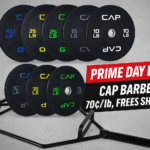 CAP Barbell Prime Day deal featuring a black trap bar and color-coded Olympic bumper plates stacked in an arc with overlay text reading “Prime Day Deal – CAP Barbell 70¢/lb, Free Shipping.”